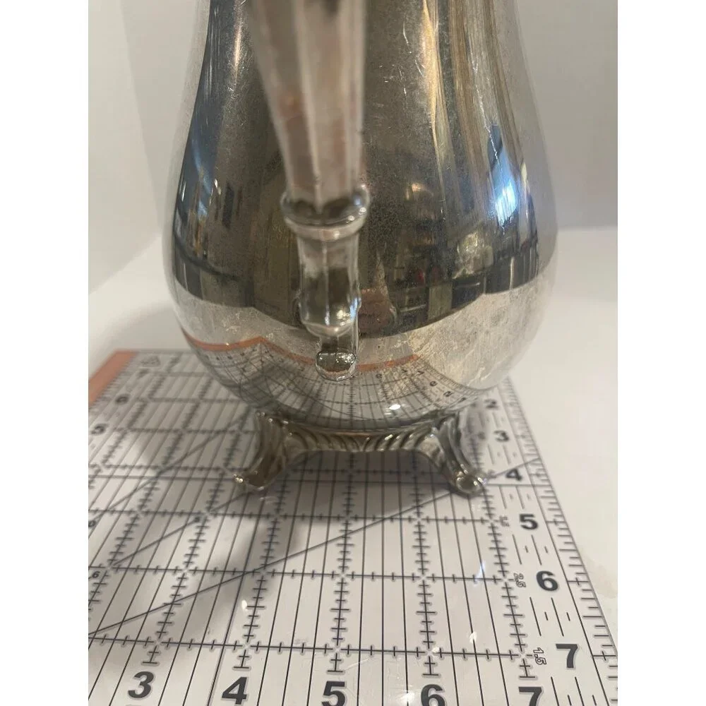 W.M. Rogers Silver Plated Water Pitcher With Guard Preowned in‎ good condition